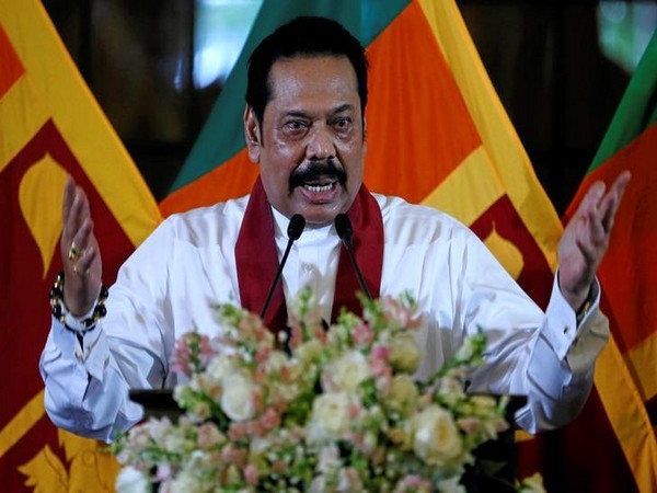 Sri Lanka’s newly appointed Prime Minister Rajapaksa addresses the gathering during the ceremony to assume his duties as the Minister of Finance and Economic Affairs at the Finance Ministry in Colombo