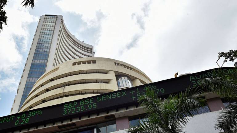 Sensex surges 743 points from day’s low, Nifty50 ends flat, Adani stocks rally up to 9%