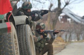 Kupwara: A soldier at the site of encounter between security personnel and militants in which militant was killed in Kralgund village of Jammu and Kashmir’s Kupwara district, on March 7, 2019. (Photo: IANS)