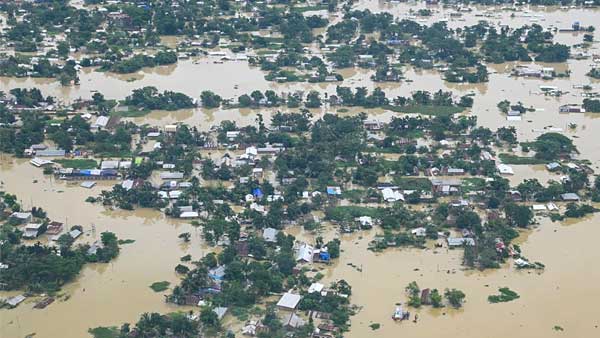 Assam Floods: Locals seek refuge on embankments, highways