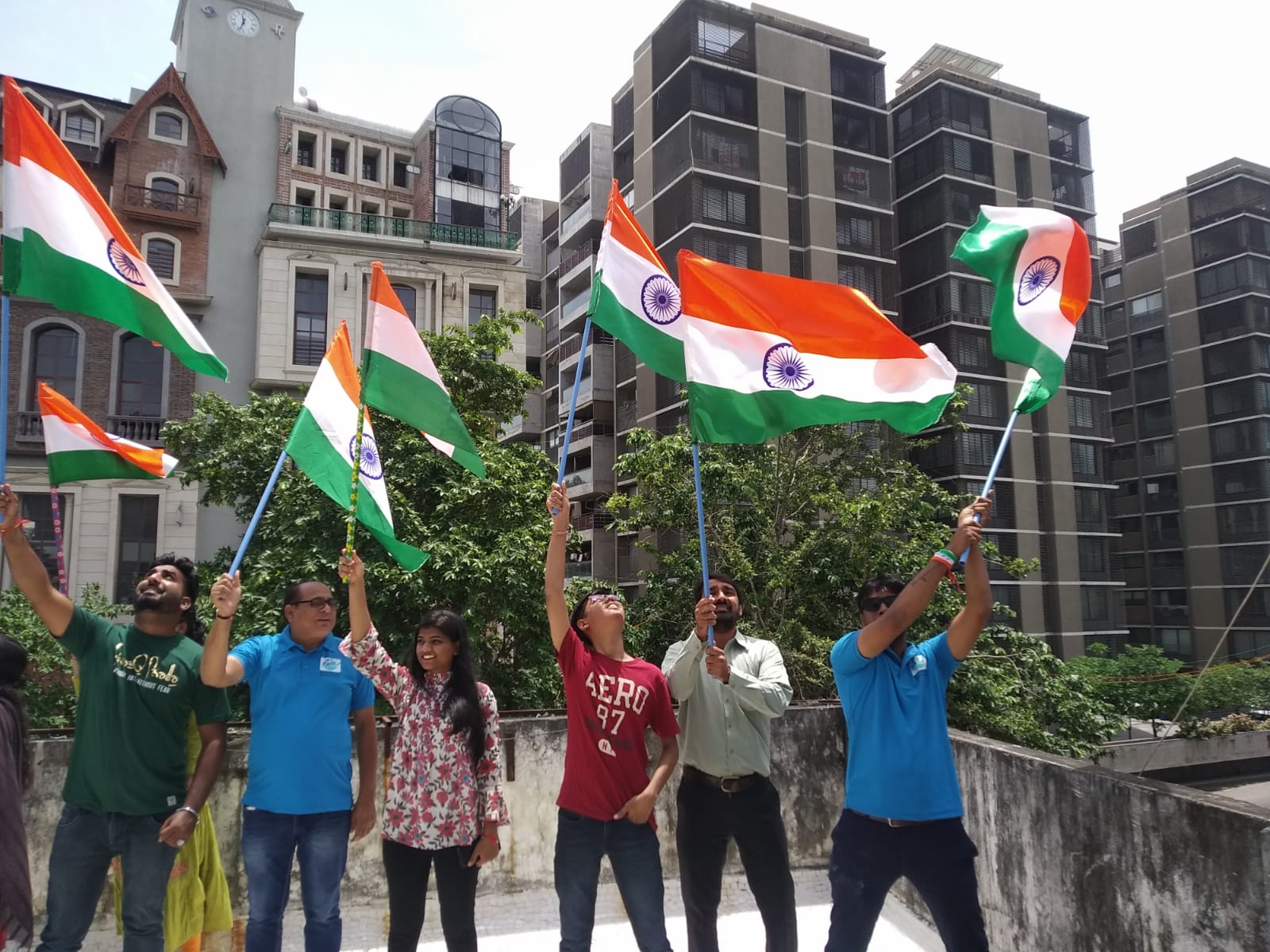 Gujarat: Offices staff hoists flags under ‘Har Ghar Tiranga’ campaign in Ahmedabad