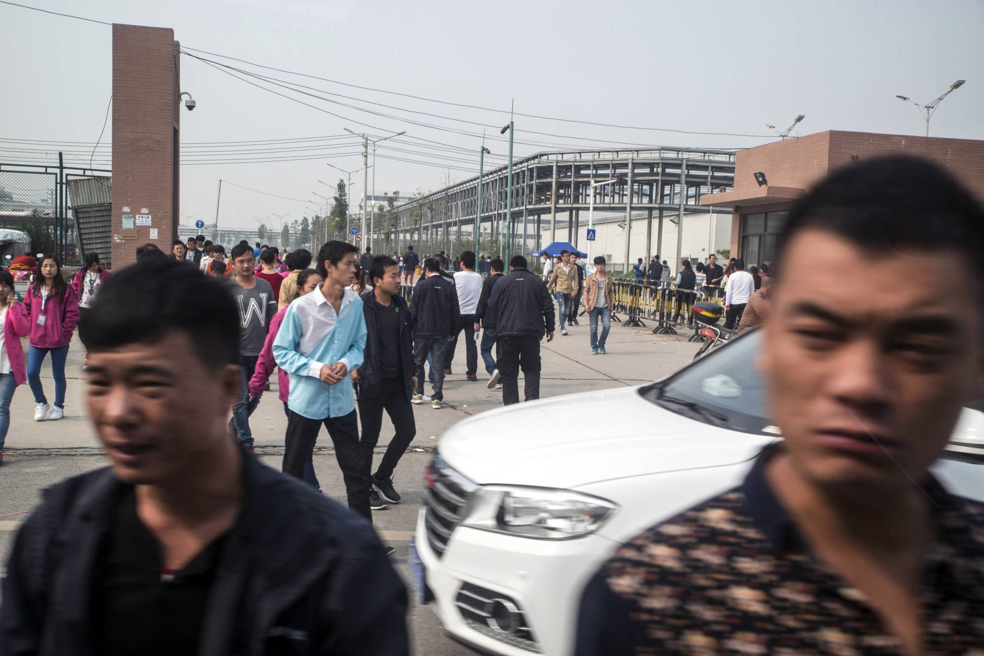 Covid-19 Surge: Mass Exodus from iPhone Factory in China