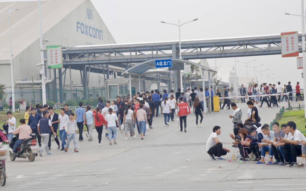 Winter waves: Covid-19 forces a 7-day lockdown around the world’s largest iPhone plant in China