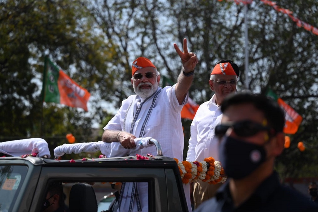 Gujarat Elections: 56.8 Per cent Turn out in the First Phase, Modi Holds a Record Roadshow in Ahmedabad