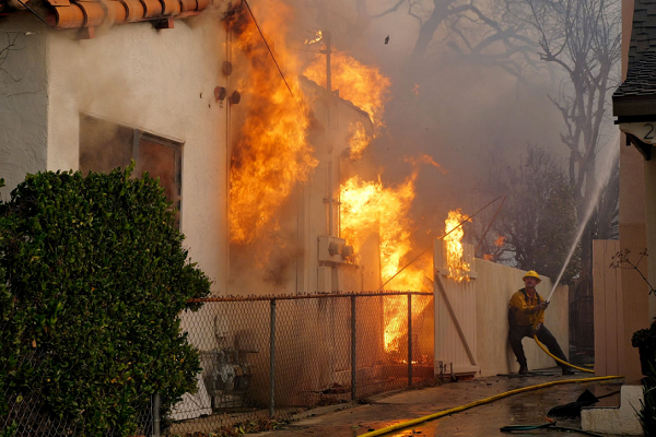 Los Angeles Wildfires Spread To Hollywood As 100,000 Ordered To Evacuate