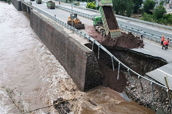 Thirty dead in Beijing following heavy rain, Xinhua reports