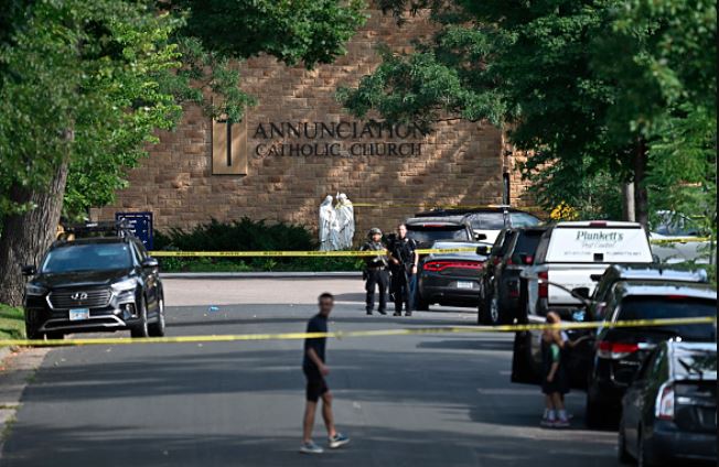 Shooter kills two Minneapolis school children in Catholic church, wounds 17 others