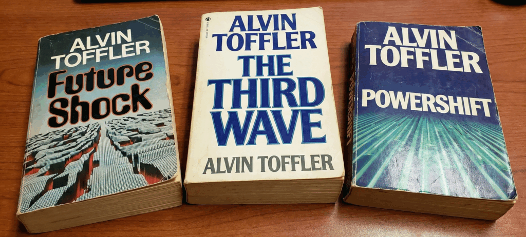 Alvin Toffler’s trilogy—Future Shock, The Third Wave, and Powershift—warns that the disorientation from accelerating change is a severe social illness. The key lesson for media and strategy is that knowledge, not wealth or force, is the ultimate power in the decentralized, "prosumer" society of the information age.