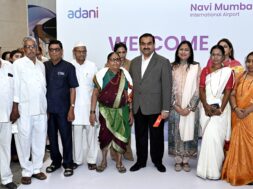 Gautam Adani with locals at NMIA