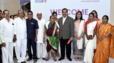 Gautam Adani with locals at NMIA