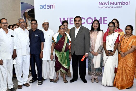 Gautam Adani with locals at NMIA