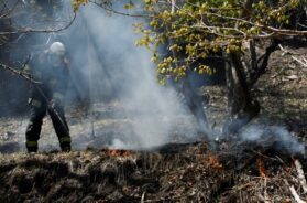 A firefighter works as wildfires continue in Otsuchi, Iwate Prefecture, Japan