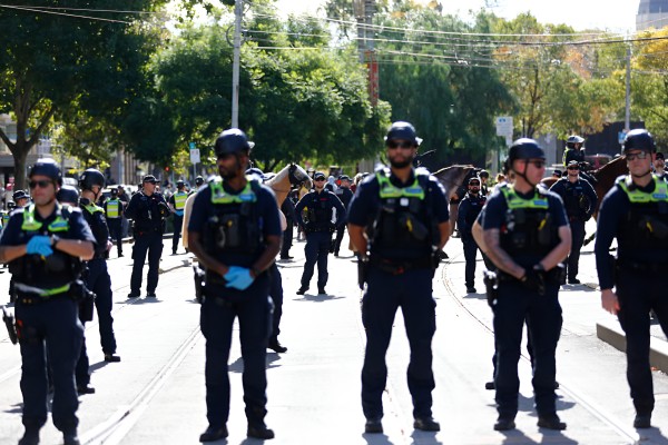 Protesters clash with Australian police after suspected killer of Indigenous girl arrested