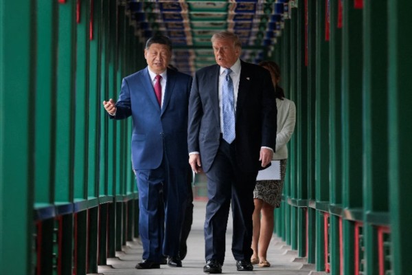 Trump touts business wins as China airs Iran, Taiwan concerns