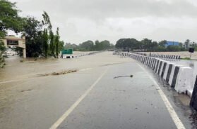 A view of an inundated Kaveri River bridge following heavy rainfall