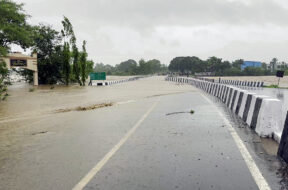 A view of an inundated Kaveri River bridge following heavy rainfall