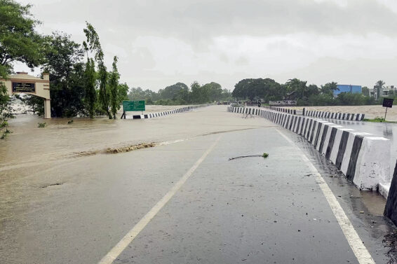 A view of an inundated Kaveri River bridge following heavy rainfall